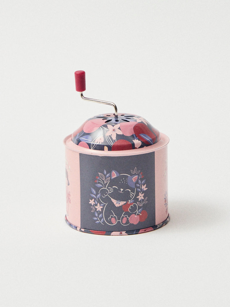 Moulin à musique rose et bleu marine imprimé pommes