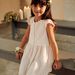 Robe écrue à broderies fantaisie
