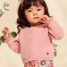 Gilet en tricot rose