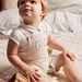 Salopette courte beige en lin et body écru