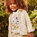 Veste en jean vanille à fleurs