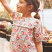 Blouse écrue à fleurs