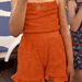 Short orange en éponge