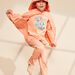 Pyjama deux pièces orange pâle en coton avec cape tête de panthère