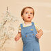 Salopette courte bleue en denim
