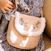 Sac beige en daim synthétique