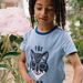 T-shirt avec animation renard en sequins et lettrage