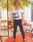 T-shirt blanc avec dinosaures sur des vélos FEMIAGE / 23E3PGB1TMC001